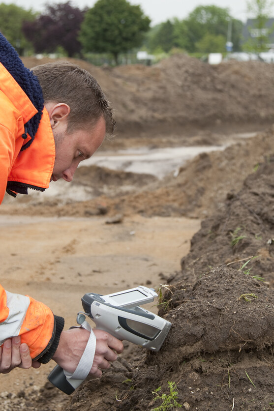 An engineer doing a soil analysis