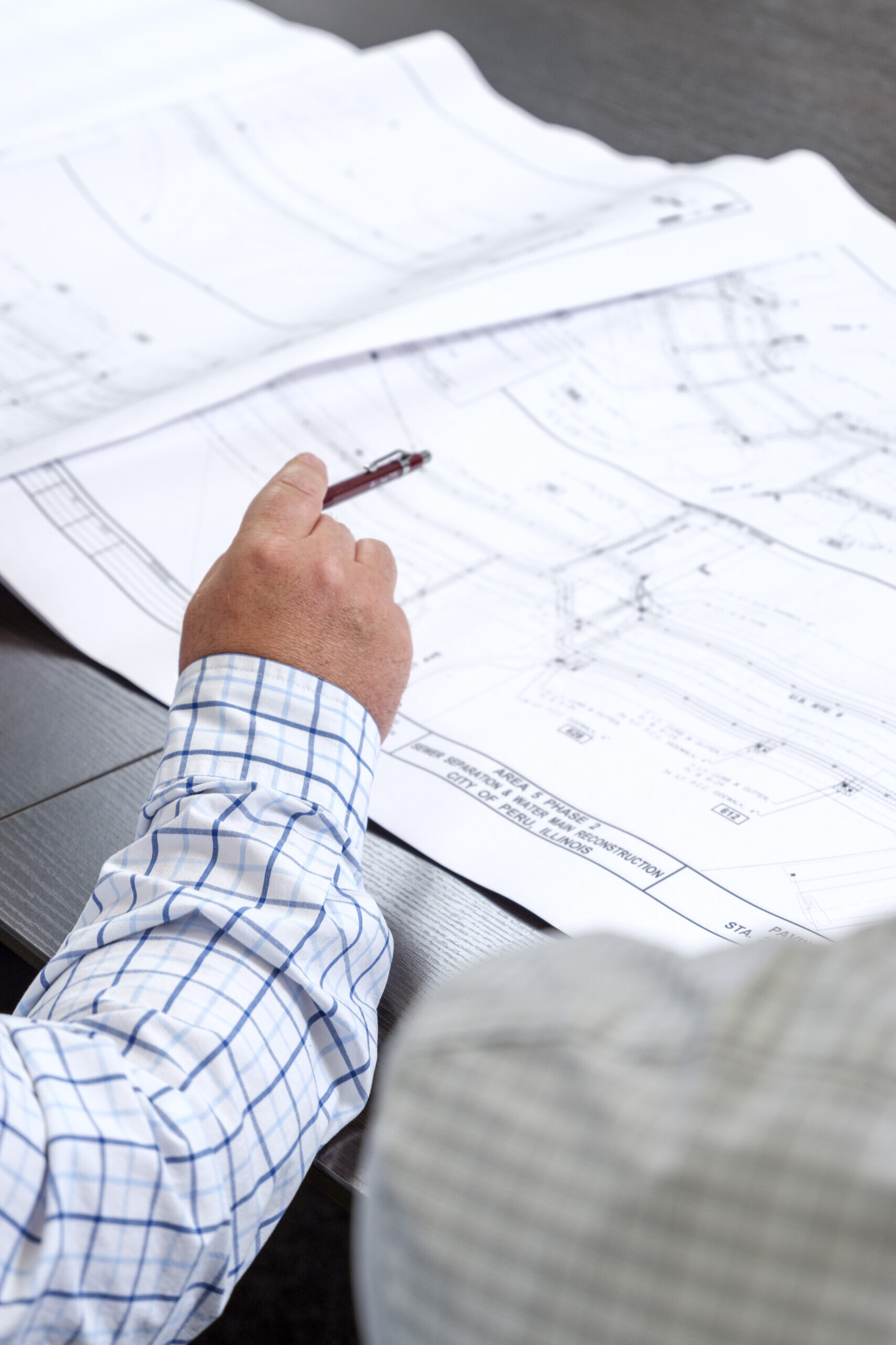 Men looking at construction plans